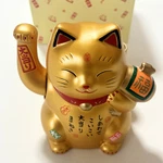 Japan Beckoning Waving Lucky Cat Electric Arm Moving Maneki Neko Lottery Holder. Fixed Price $110.49.