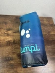 Rumpl The Original Puffy Blanket 1-PERSON W Stuff Sack Ocean Blue 52"X75". Fixed Price $54.99.