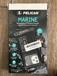Pelican Marine IP68 Waterproof Floating Phone Pouch - Black Xl Open Box. Fixed Price $19.99.
