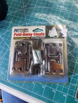 2 Pack Highland Fold-away Cleats W/hardware, Rust Free Chrome Finish, 91501. Fixed Price $14.99.