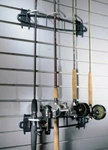 Organized Living Schulte Hook, Four Fishing Rods With Reels. Fixed Price $55.00.